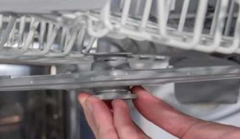 Dishwasher top rack not cleaning.